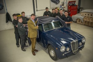 Philip Dunne MP unveils the 1955 Lancia Aurelia that the eight CMC apprentices will restore over the next 14 months_CMC_1